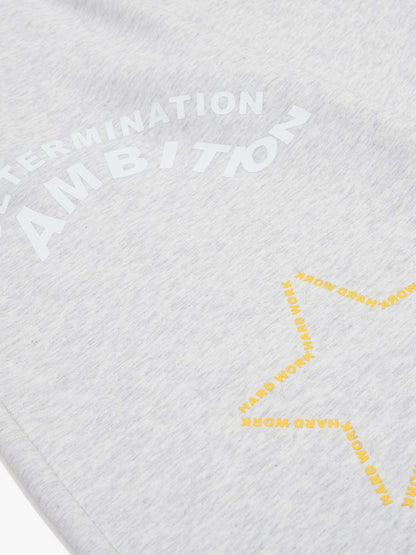 Pantalon de survêtement à jambes larges avec typographie multicolore