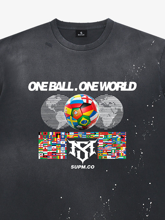 Unisex distressed loose-fitting cotton short-sleeved T-shirts featuring a "One ball, one world" slogan print and an ink-splatter wash finish. 