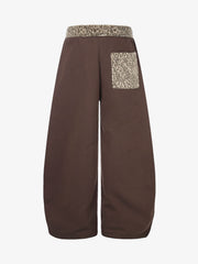 Pantaloni della tuta larghi con applicazioni a stella leopardata