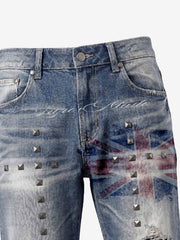 Pantalones vaqueros de bota con bandera y tachuelas