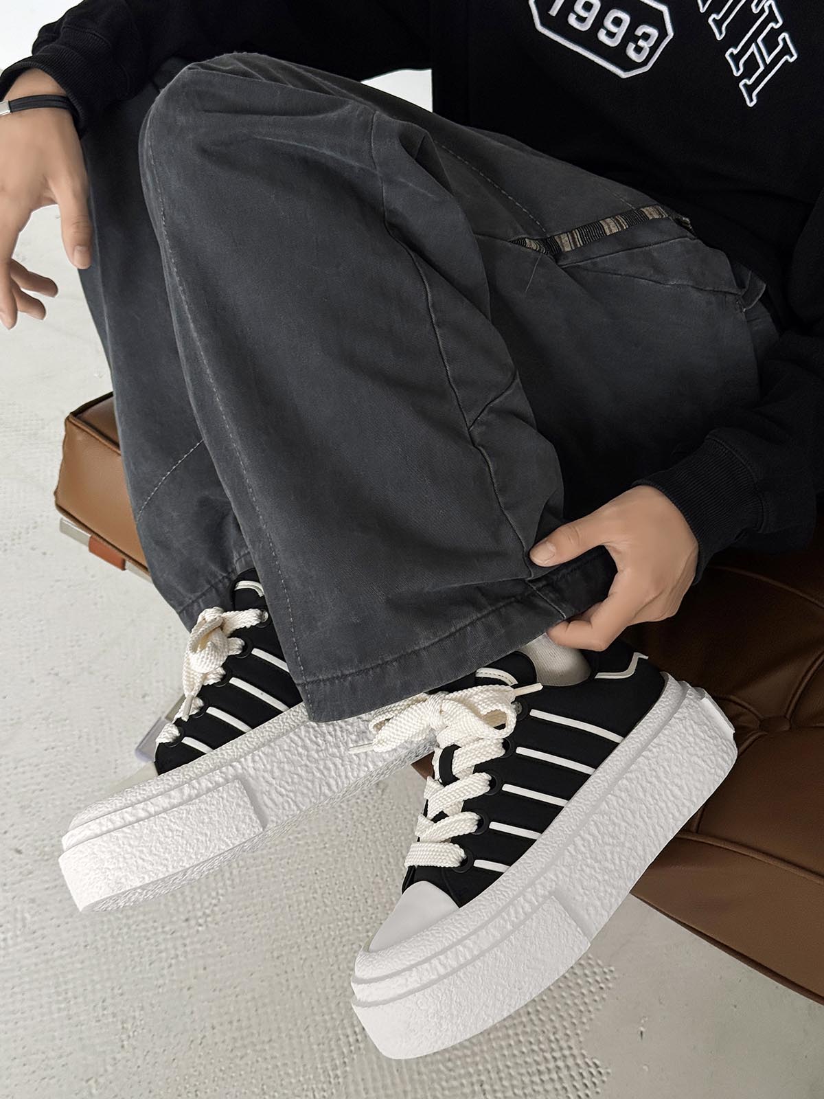 Hidden Height-Boosting Sneakers with Stylish Platform Design 