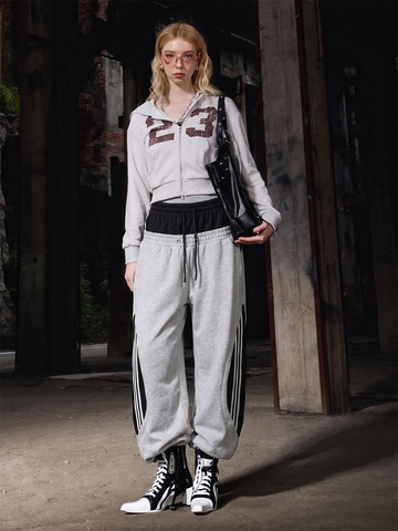 Pantaloni della tuta a gamba larga con doppia fascia in vita e strati sovrapposti