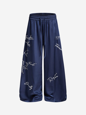 Weite Hose mit Schriftzug und Kordelzug