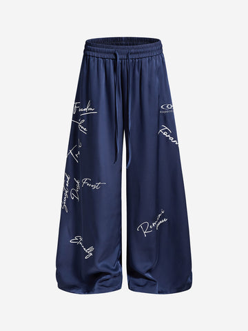 Weite Hose mit Schriftzug und Kordelzug