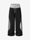 Pantaloni della tuta a gamba larga con doppia fascia in vita e strati sovrapposti