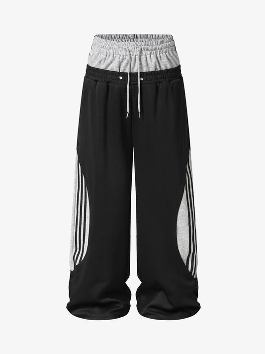 Pantaloni della tuta a gamba larga con doppia fascia in vita e strati sovrapposti
