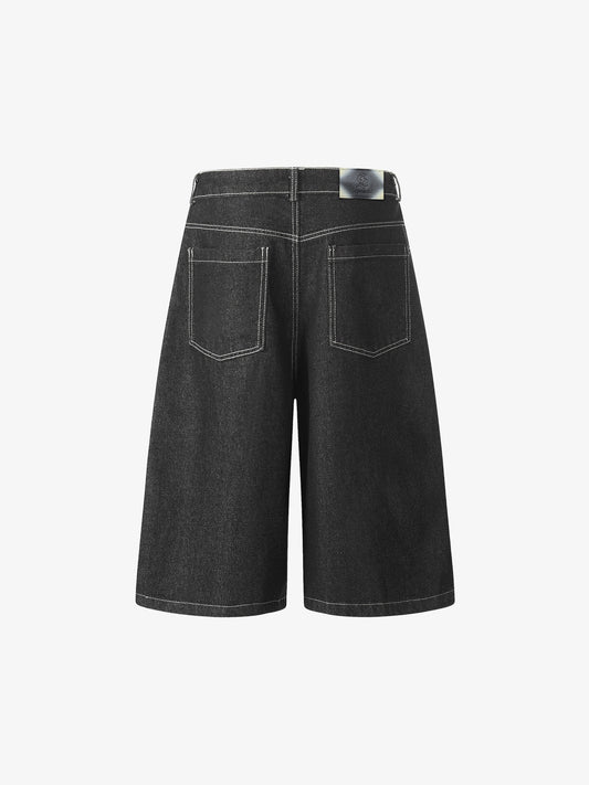Pantaloncini in denim con cuciture a contrasto e motivo a fiamme