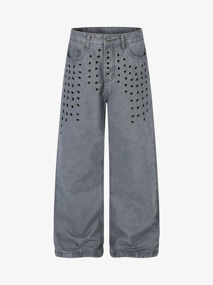 Jeans à rivets découpés