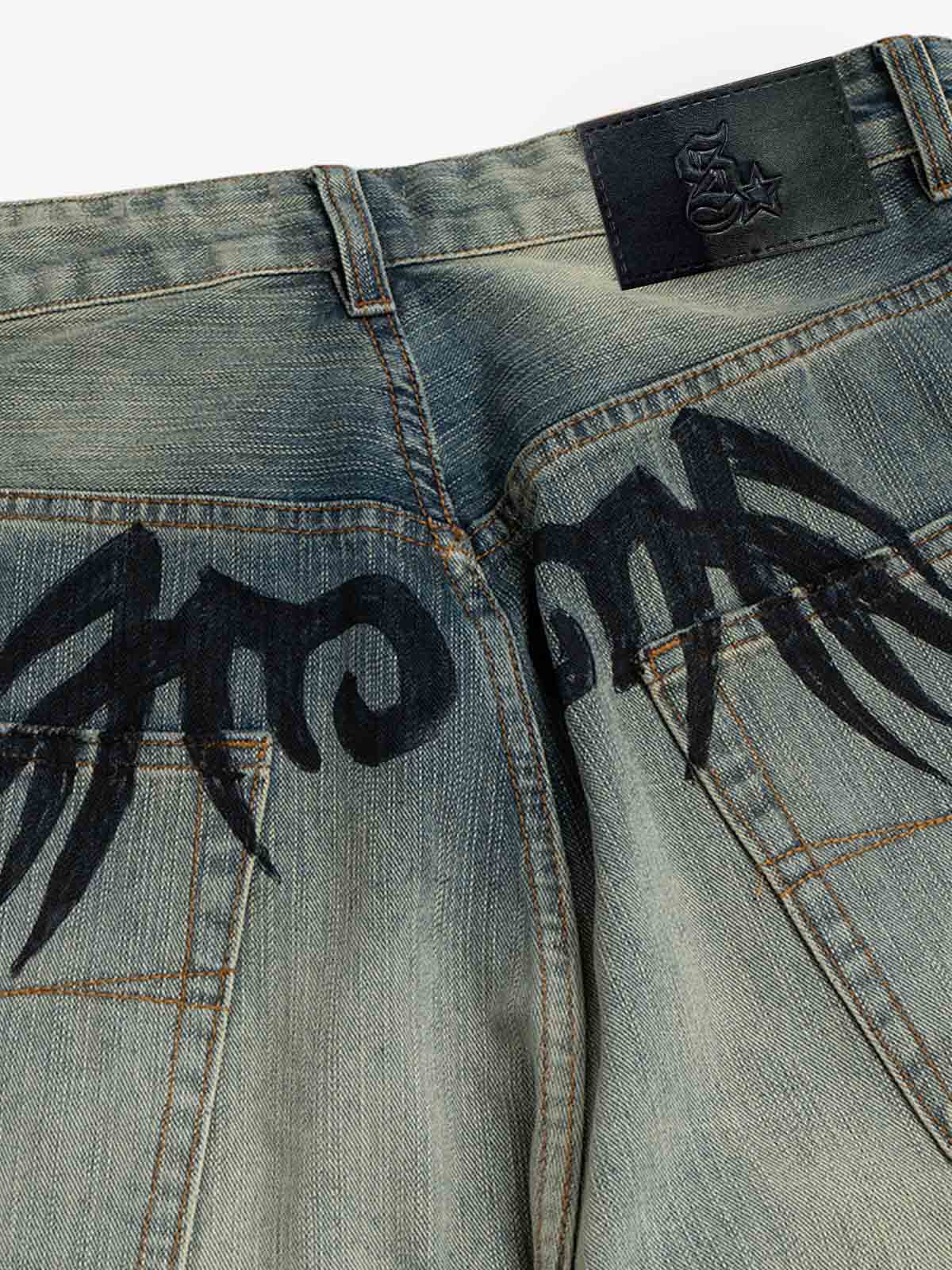 Unique Wide-Leg Denim Pants with Artistic Spider Design for Fashion Lovers 