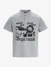 Cotton blend loose-fitting stand-up collar button-front short-sleeved T-shirt with anti-war print. 