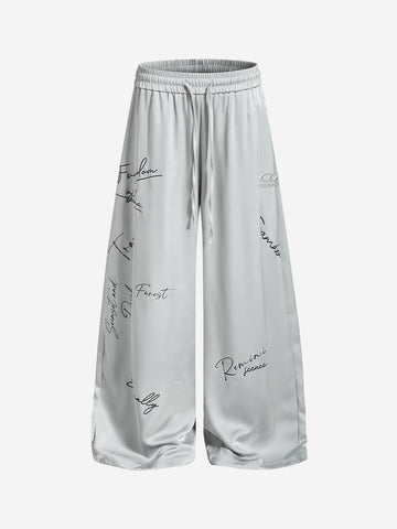 Weite Hose mit Schriftzug und Kordelzug