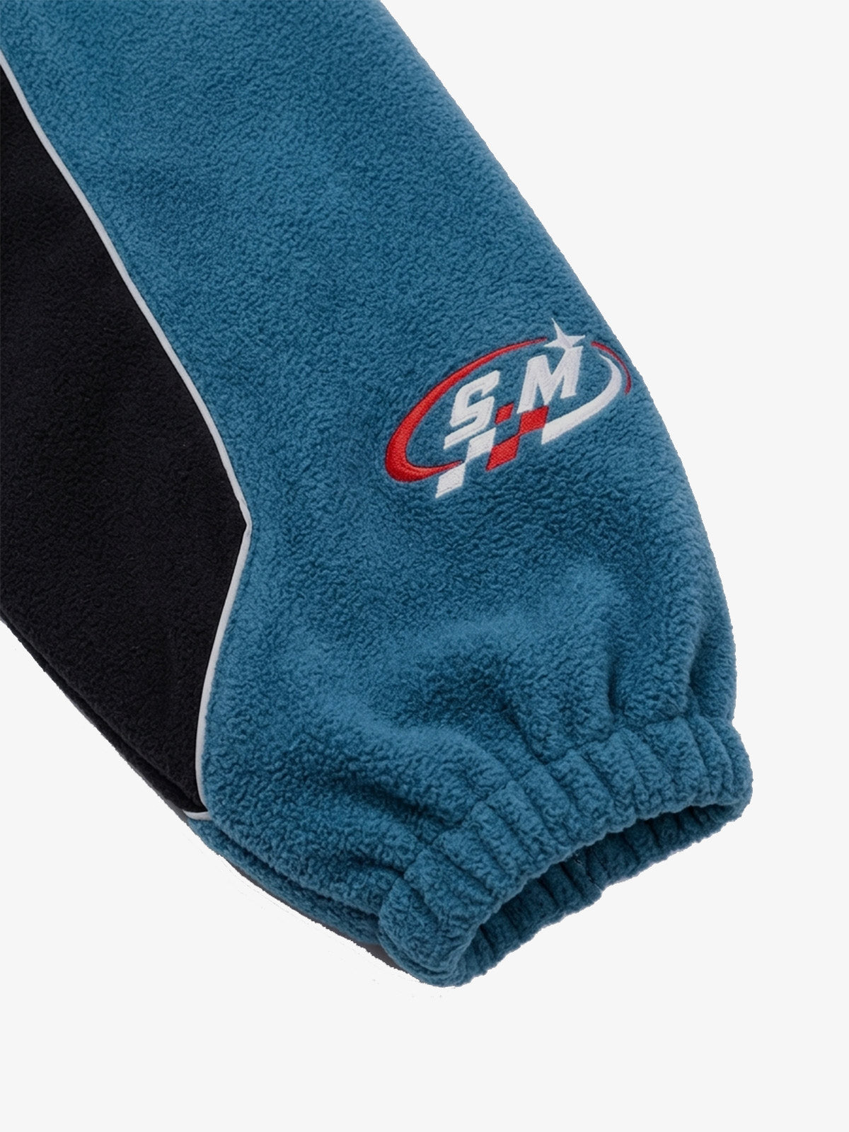 Chaqueta con capucha y cremallera, con paneles de sherpa en bloques de color
