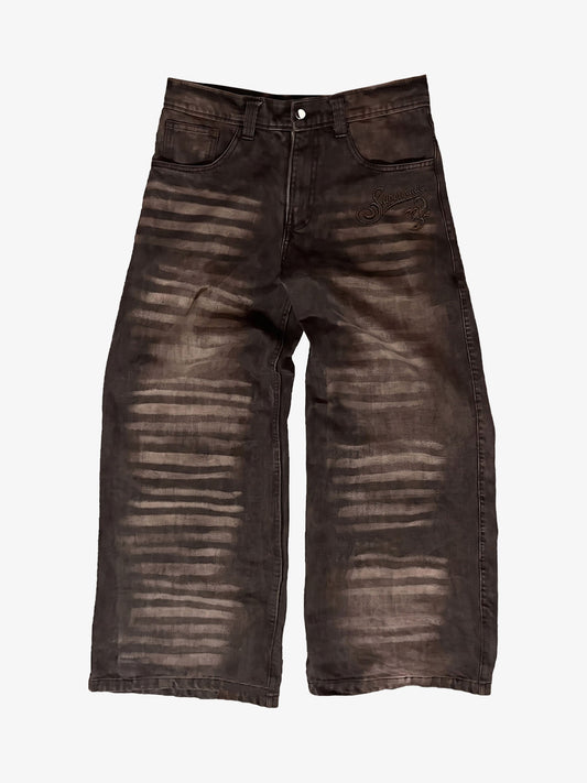 Jeans mit Skorpionstickerei