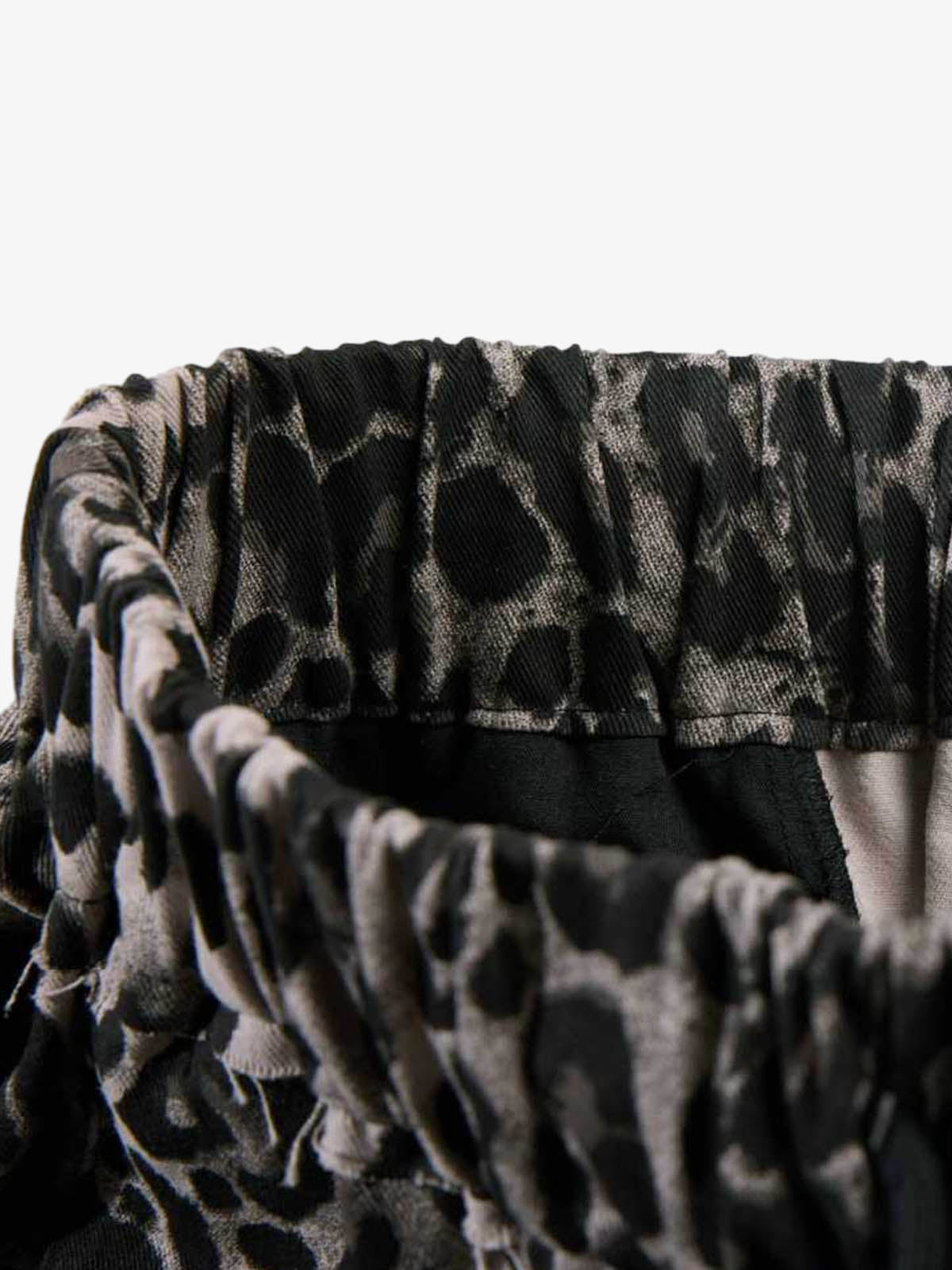 Stylish Leopard Print Wide-Leg Pants with Unique Graphic Design 