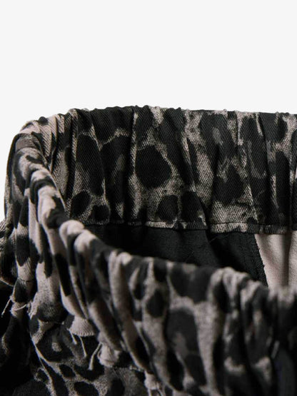 Stylish Leopard Print Wide-Leg Pants with Unique Graphic Design 