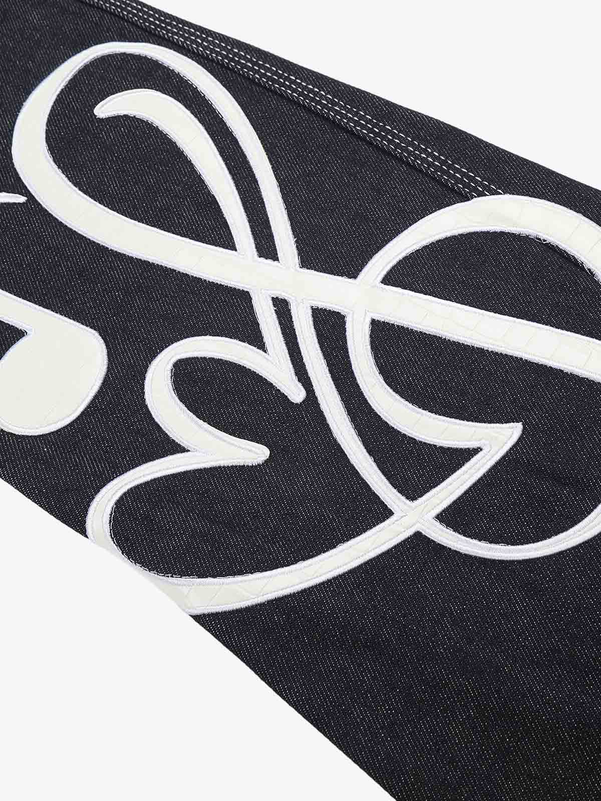 Musical Note Embroidery Raw Denim Jeans