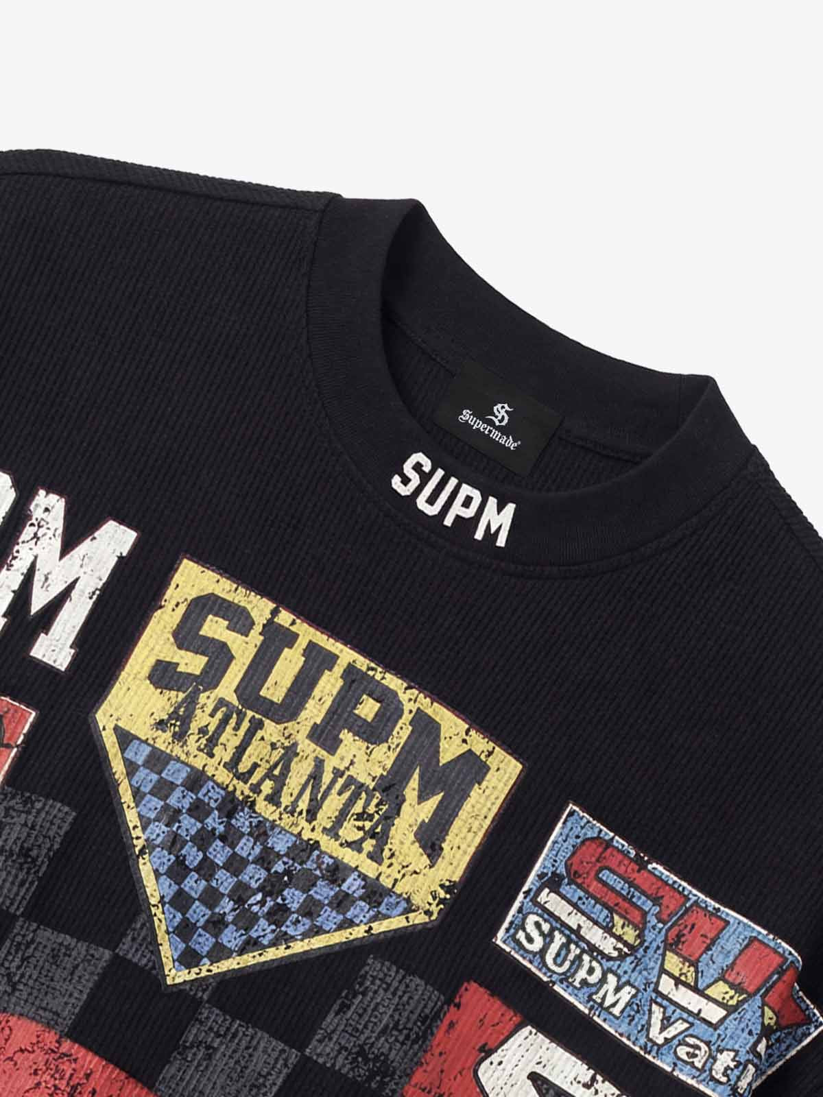 Cotton Oversized Graphic T-Shirt with Newspaper Print and Metal Eyelets 