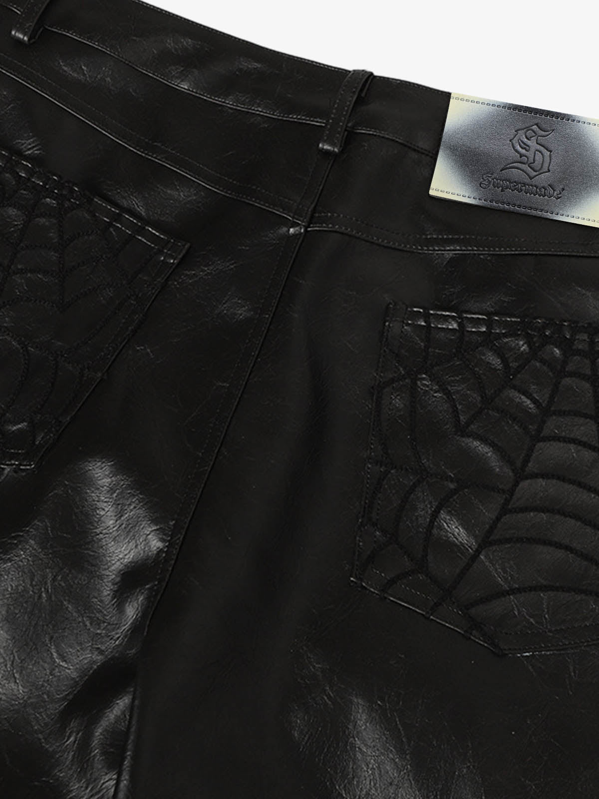 Faux Leather Wide Leg Pants with Spiderweb Embossed Pockets - Edgy Fashion Statement 