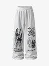 Dunkle Jogginghose mit Grafikdruck