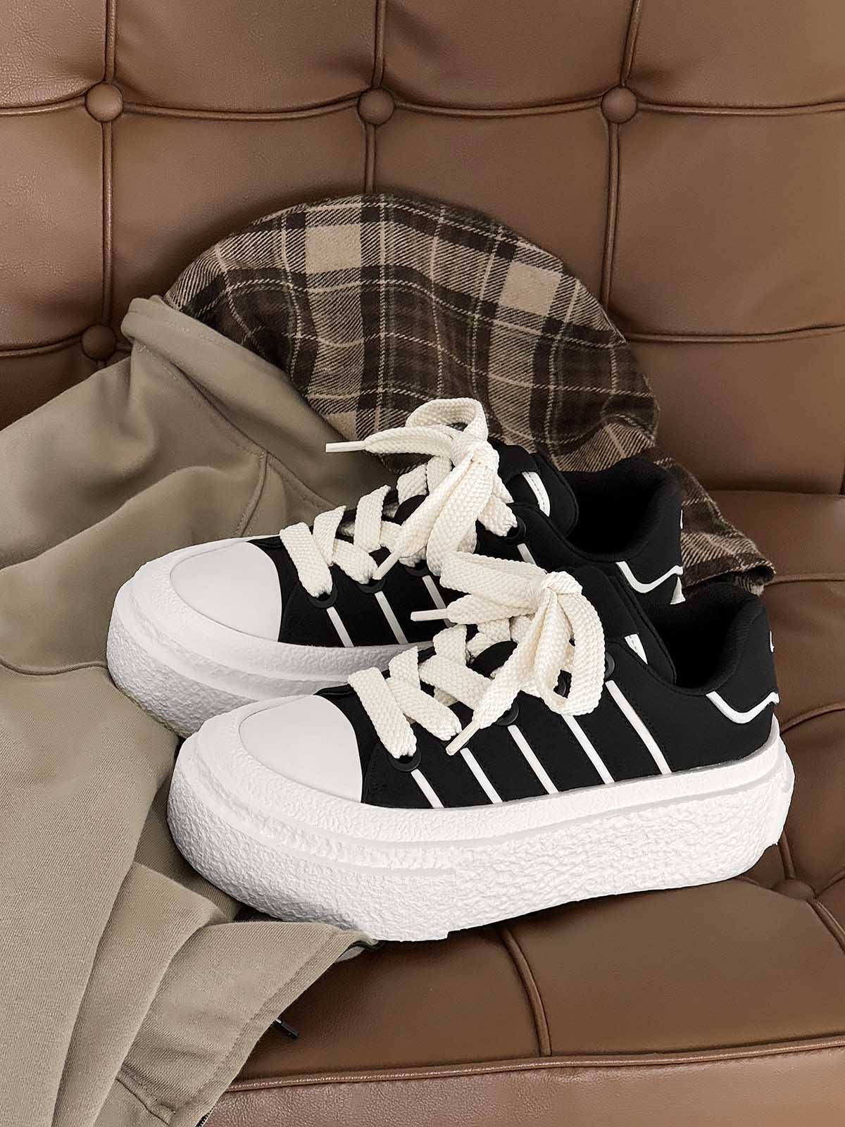 Hidden Height-Boosting Sneakers with Stylish Platform Design 