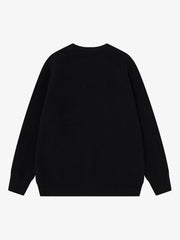 Maglione in maglia jacquard con teschio scuro