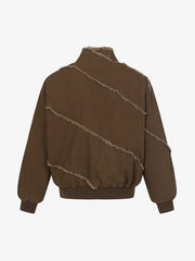 Dekonstruierte Patchwork-Jacke mit ausgefransten Kanten und ausgewaschenem Design