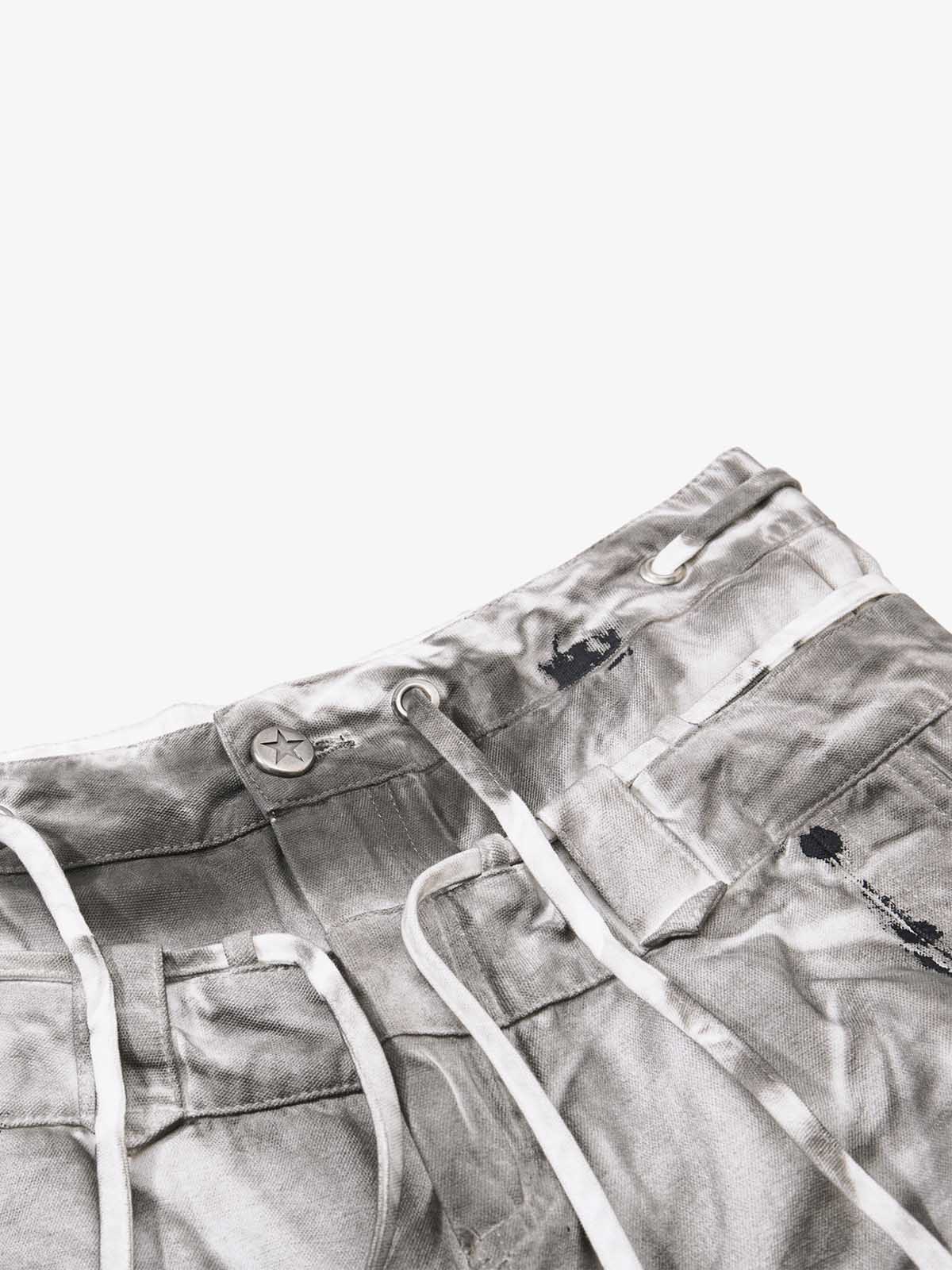 Pantalones anchos desgastados