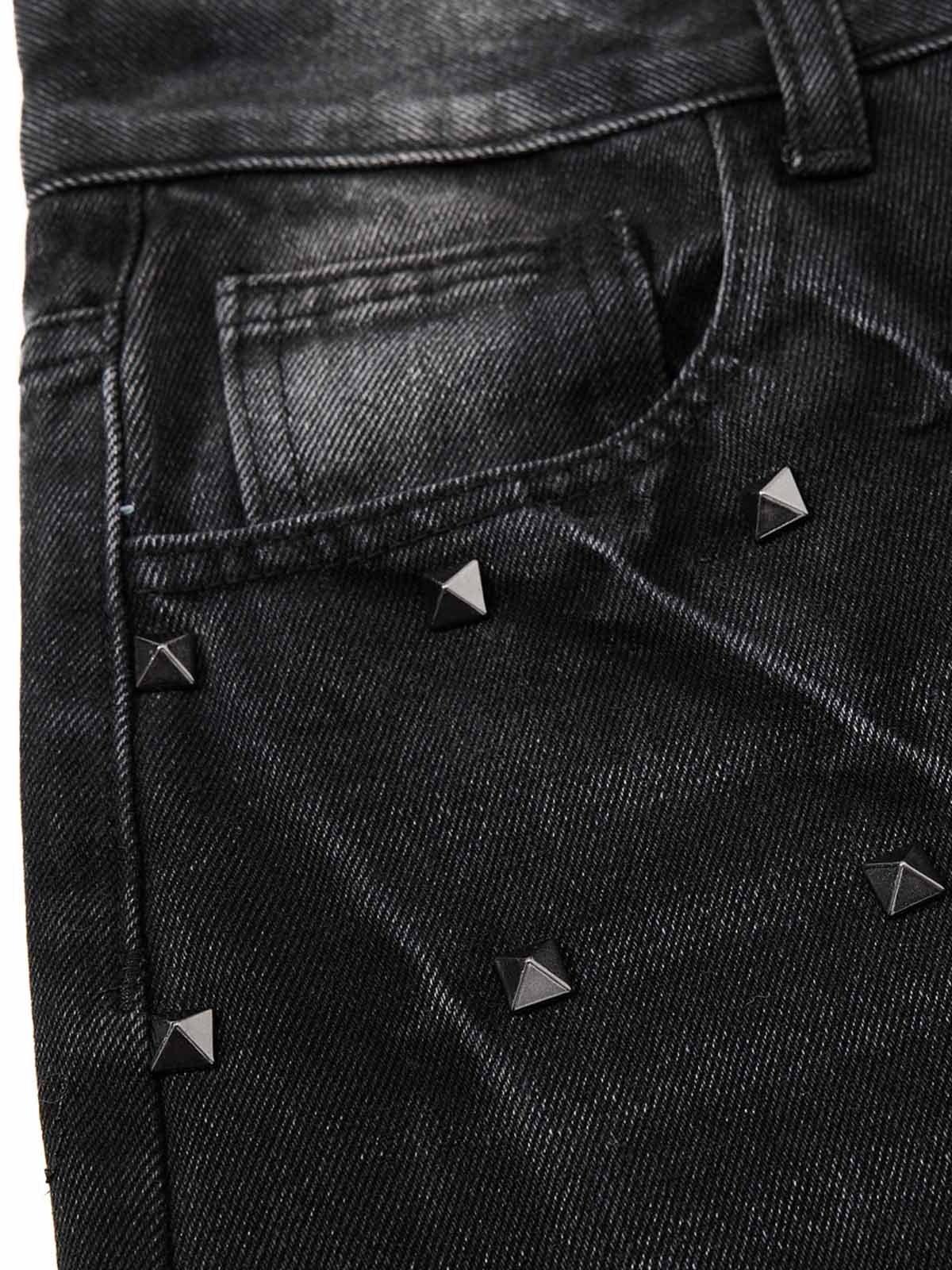 Schwarze, gewaschene, weite, knöchellange Jeans