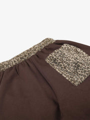 Pantaloni della tuta larghi con applicazioni a stella leopardata