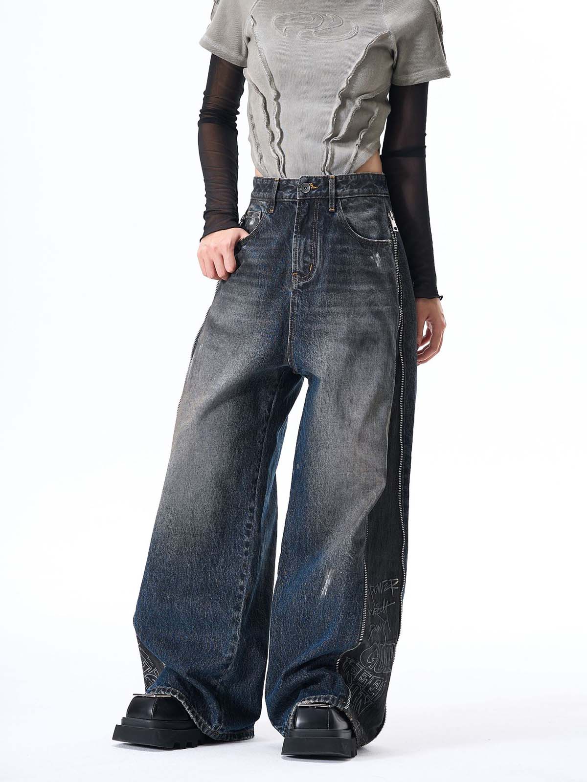 Wide-Leg Denim Jeans with Unique Zipper Design and Graffiti Artwork 