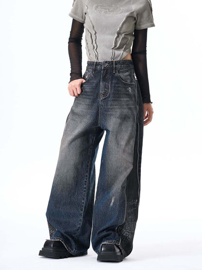 Wide-Leg Denim Jeans with Unique Zipper Design and Graffiti Artwork 