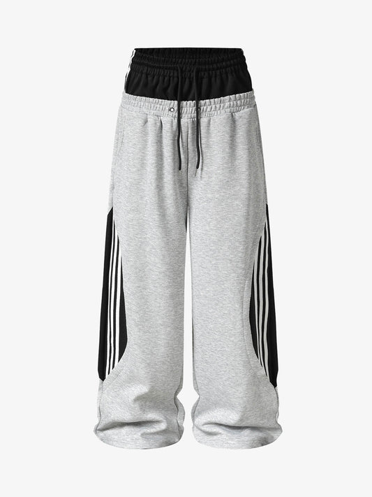 Pantaloni della tuta a gamba larga con doppia fascia in vita e strati sovrapposti