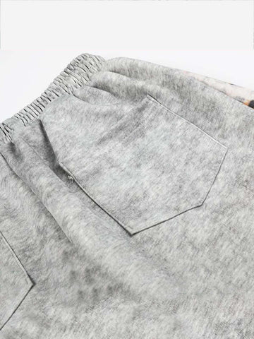 Pantalon de survêtement patchwork léopard avec logo strass