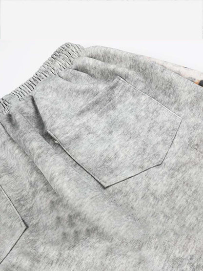 Pantalon de survêtement patchwork léopard avec logo strass