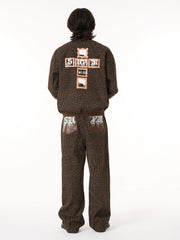SUPM Graffiti Print Leather Leopard Print Baggy Pants 