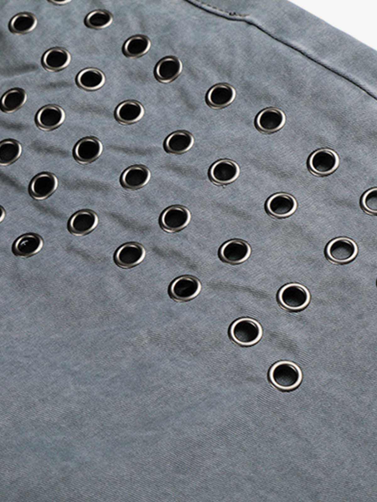Jeans à rivets découpés