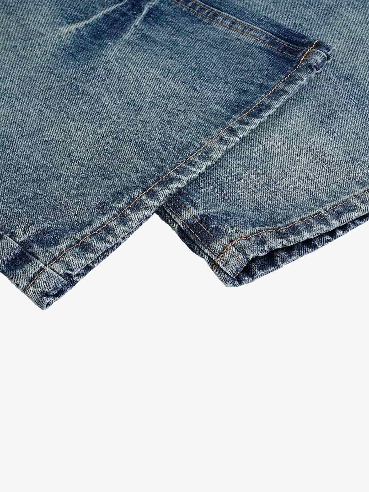 Jeans délavés et usés