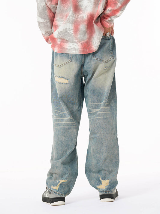 Distressed Denim Jeans with Embellished Patches and Bold Lettering - Perfect for Trendy Streetwear 