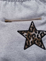 Completo due pezzi con stampa leopardata a righe