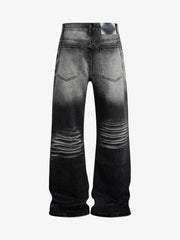 Jeans délavés et usés