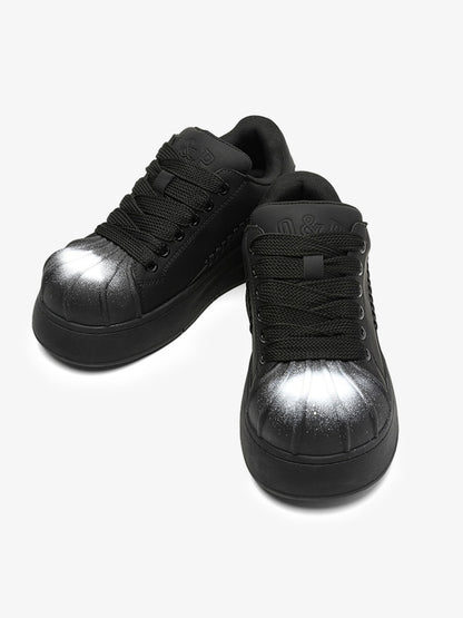 Black Chunky Sneakers with Fluid Lines and Granular Outsole for Everyday Wear 