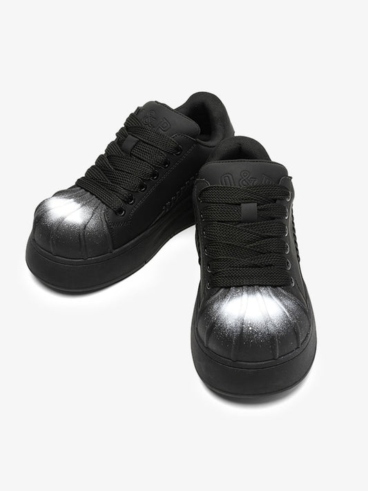 Black Chunky Sneakers with Fluid Lines and Granular Outsole for Everyday Wear 