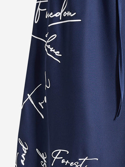 Weite Hose mit Schriftzug und Kordelzug
