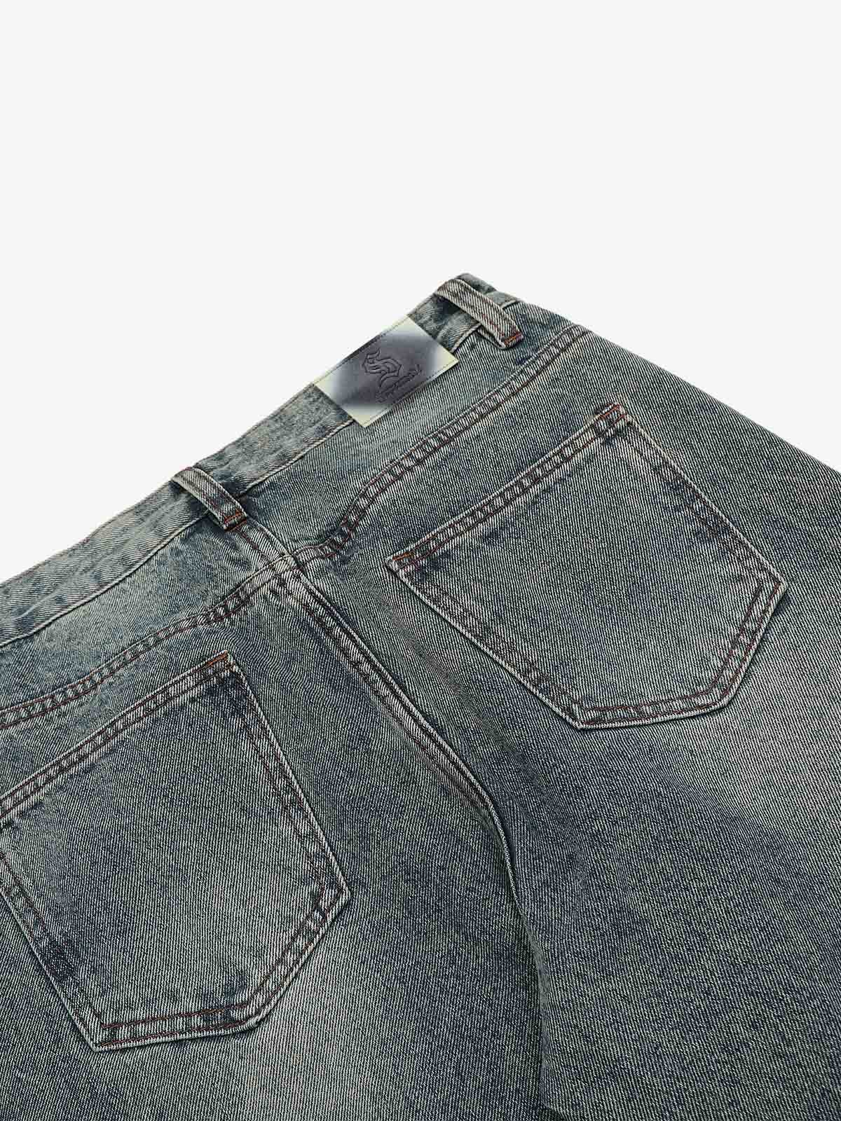 Distressed Pleated Flared Jeans