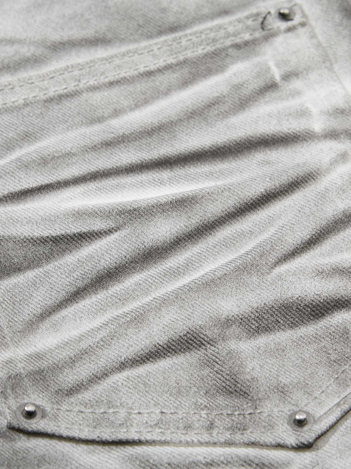Heavy-duty Waxed Flared Jeans