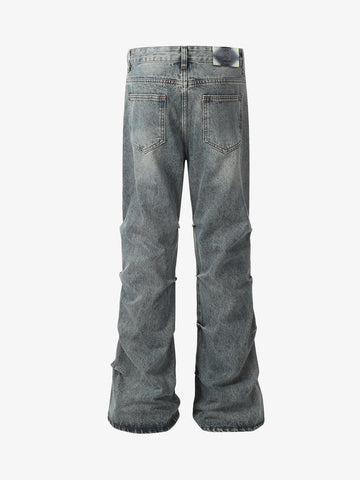 Distressed Pleated Flared Jeans