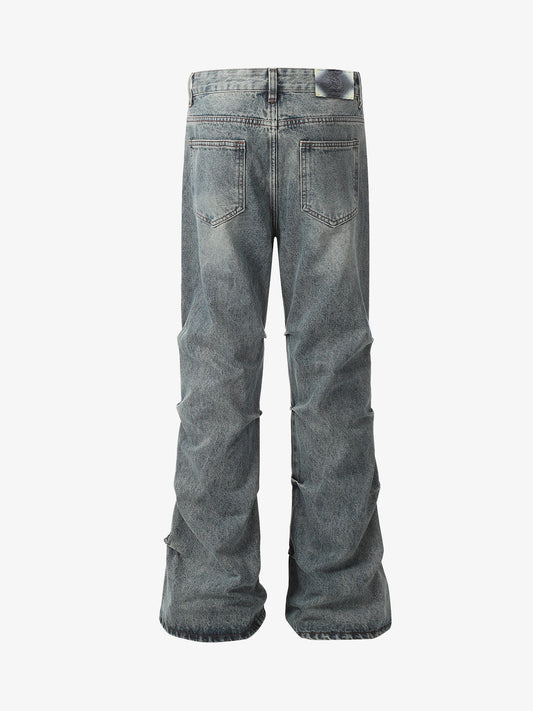 Distressed Pleated Flared Jeans
