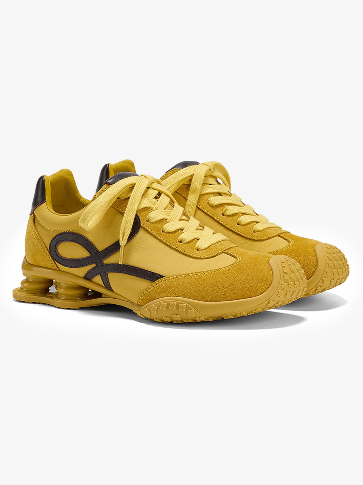 Sneakers in pelle scamosciata con ammortizzazione a molla