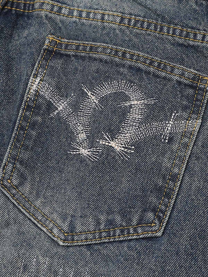 Distressed Camouflage Patchwork Jeans 