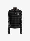 Polo de rayas con estampado de leopardo